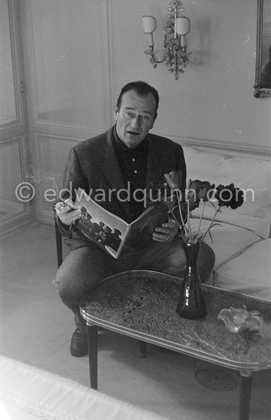 John Wayne, a keen yachtsman, was invited by Aristotle Onassis to stay on board his yacht, Christina, in Monaco harbor, 1955. The yacht was very luxuriously furnished and John Wayne was given a cabin with all the latest beauty aids attached. - Photo by Edward Quinn