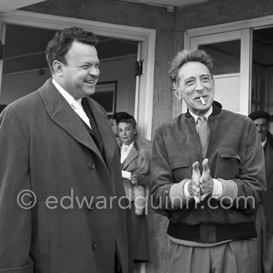 Jean Cocteau and Orson Welles. Nice Airport 1952. - Photo by Edward Quinn