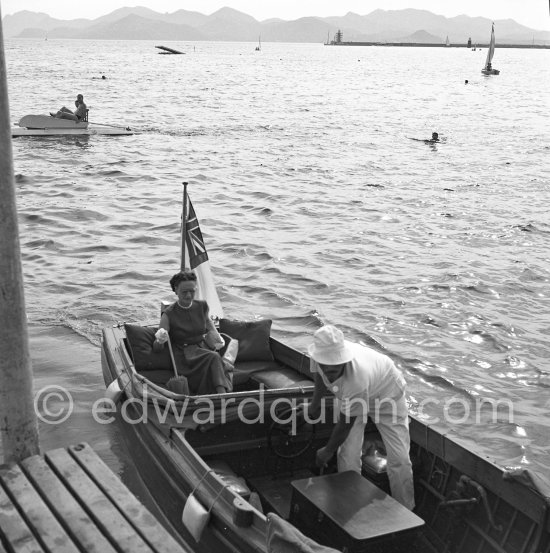 Duchess of Windsor, coming from yacht Olnico. Villefranche harbor 1951. - Photo by Edward Quinn