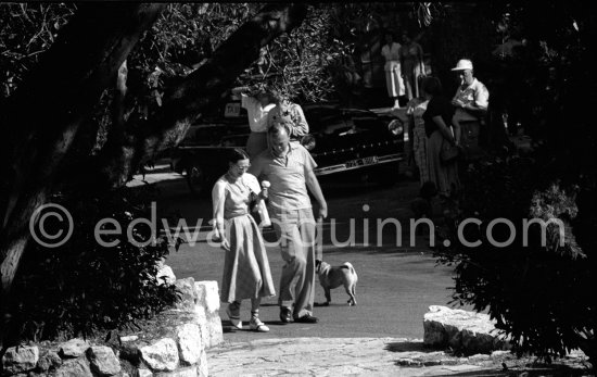 Jimmy Donahue, a heir to the Woolworth estate, and Wallis Simpson, Duchess of Windsor with the Windsor’s Pug. Although openly gay, Donahue claimed he had a four-year affair with the Duchess. Cannes 1953. - Photo by Edward Quinn