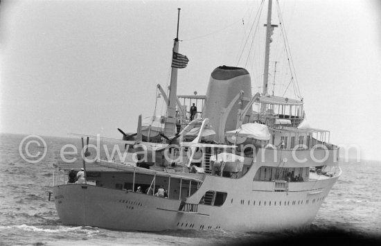 Aristotle Onassis on his yacht Christina with Italian twin-engine amphibian flying boat G-APNY Piaggio P-136L SERIES 2 C/N 242. Monaco harbor 1955. - Photo by Edward Quinn