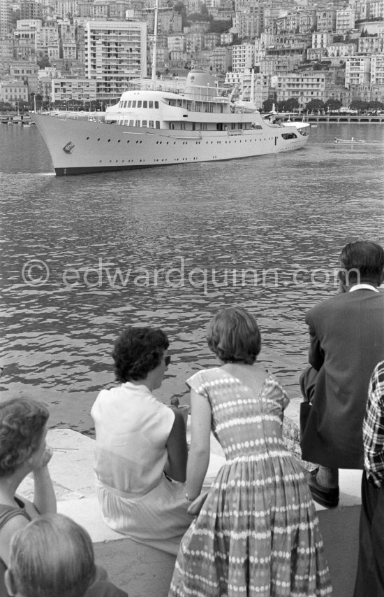 Admiring Onassis\' yacht Christina with aircraft G-APNY Piaggio P-136L SERIES 2 C/N 242. Monaco harbor 1955. - Photo by Edward Quinn