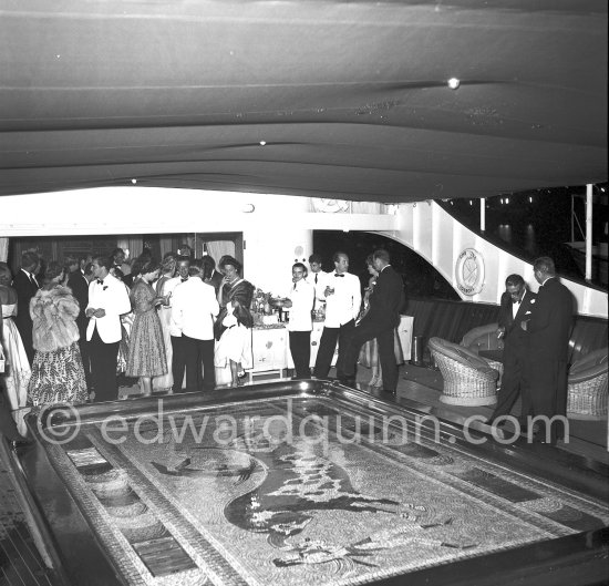 Cocktail on bord the Christina. Far right Aristotle Onassis. Monte Carlo 1954. - Photo by Edward Quinn