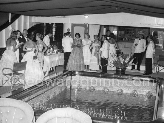 Cocktail on board the yacht Christina. Tina Onassis.Monaco harbor. August 1956. - Photo by Edward Quinn