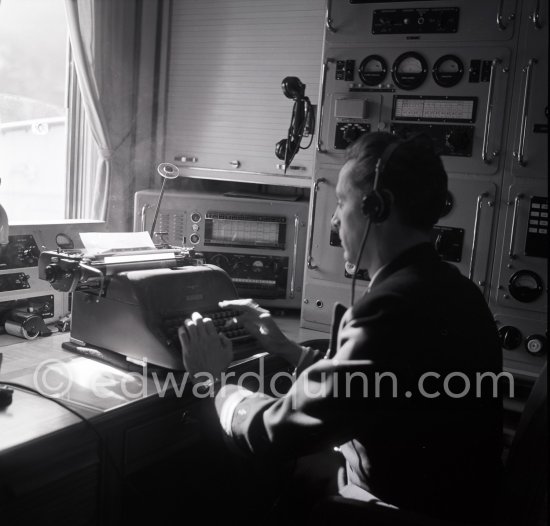 Radio officer on board Onassis\' yacht Christina. Monaco harbor 1955. - Photo by Edward Quinn