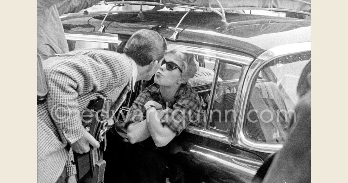 A kiss for the photographer. Edward Quinn and American