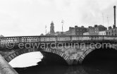 The River Liffey, Arran Quay. Father Mathew Bridge, St Paul's Church on the other side. Dublin 1963. - Photo by Edward Quinn