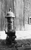 Freshwater fountain near Coles. Dublin 1963. Published in Quinn, Edward. James Joyces Dublin. Secker & Warburg, London 1974. - Photo by Edward Quinn