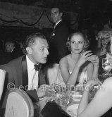 Gianni Agnelli and Dolores Guinness at the UN Refugees children charity gala at the Sporting d’Eté. Monte Carlo 1958. - Photo by Edward Quinn