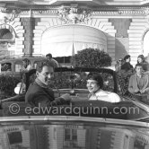 Jean-Pierre Aumont, French actor, and not yet identified friend. Cannes Film Festival 1954 on Croisette. Car: Oldsmobile Futuramic 88 1950 - Photo by Edward Quinn