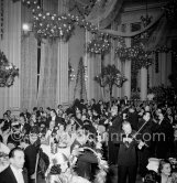 Bal de la Rose gala dinner at the International Sporting Club in Monte Carlo, 1954. Farouk, ex King of Egypt with Irma Minutolo, one of his last companions (center of photo) - Photo by Edward Quinn