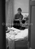 Brigitte Bardot  in her room at the Hotel Negresco. With a portable radio. Nice 1955. - Photo by Edward Quinn