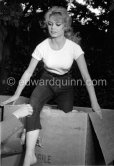 Brigitte Bardot during filming of "Une parisienne". Studios de la Victorine, Nice 1957. - Photo by Edward Quinn