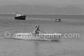 Brigitte Bardot on a speed boat near her home "La Madrague". Saint-Tropez 1961. - Photo by Edward Quinn