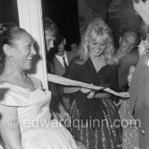 Brigitte Bardot opening an exhibition at Saint-Tropez 1958. - Photo by Edward Quinn