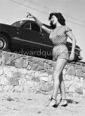 Myriam Bru, "Miss Cannes" and "Miss Côte d’Azur 1950", who later married German actor Horst Buchholz and became fashion model agent. Probably Juan-les-Pins 1951. Car: 1951 Ford Custom Tudor Sedan - Photo by Edward Quinn