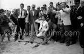 Several well known people were present at the Cannes Film Festival in 1963. Italian actress Claudia Cardinale, Luchino Visconti (left). Most attention however was given to the leopard, heraldic animal in the film "Il Gattopardo". - Photo by Edward Quinn