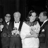 Charlie Chaplin with his wife, Oona, the daughter of the playwrighter Eugene O'Neill at the Figaro Gala in Cannes 1953. - Photo by Edward Quinn