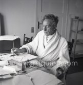 Jean Cocteau at Villa Santo Sospir, working on ink drawing "Souvenirs de Jean Cocteau". Saint-Jean-Cap-Ferrat 1952. - Photo by Edward Quinn