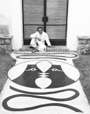 Jean Cocteau with his mosaic at Villa Santo Sospir. Saint-Jean-Cap-Ferrat 1952. - Photo by Edward Quinn