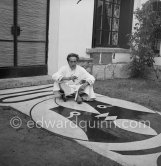 Jean Cocteau with his mosaic at Villa Santo Sospir. Saint-Jean-Cap-Ferrat 1952. - Photo by Edward Quinn