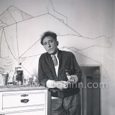 Jean Cocteau at Villa Santo Sospir of his close friend Francine Weisweiller in front of one of the murals he made for the interior walls. Saint-Jean-Cap-Ferrat 1954. - Photo by Edward Quinn