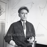 Jean Cocteau at Villa Santo Sospir of his close friend Francine Weisweiller in front of one of the murals he made for the interior walls. Saint-Jean-Cap-Ferrat 1954. - Photo by Edward Quinn