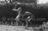 "L'homme chien" (Guy Dute and Jean-Claude Petit). During filming of "Le Testament d’Orphée", film of Jean Cocteau. Saint-Jean-Cap-Ferrat 1959. - Photo by Edward Quinn
