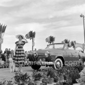Concours d’élégance Automobile, Catégorie C: Studebaker Champion Regal Convertible 1951, No. 21 of Mr. Duchasseint, won the Prix d’Honneur with Janine Lagarde, "Miss Montmartre" with a poodle. Cannes 1951. - Photo by Edward Quinn