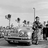 Concours d’Elégance Automobile. Prix d'Honneur, with Comtesse de Menou who won "Prix de la plus belle toilette du printemps" (most beautiful sporting dress). Bristol Type 402 Drophead Coupé. Cannes 28.3.1951. - Photo by Edward Quinn