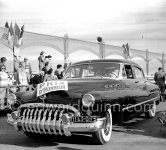 Concours d’Elégance Automobile at Cannes. Categorie F: No. 64 1950 Buick Super Riviera Sedan Model 52 of Princess Colleredo-Mansfeld won Prix d'Honneur. She also won "Prix de la plus élégante toilette habillé (the most elegant ensemble). Cannes, 28.3.1951. - Photo by Edward Quinn