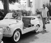 Gary Cooper's long legs fit well into the beach buggy of English millionaire James Hanson. Eden Roc, Cap d’Antibes 1959. Car: 1959 Fiat 600 Jolly. - Photo by Edward Quinn