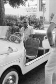 Gary Cooper's long legs fit well into the beach buggy of English millionaire James Hanson. Eden Roc, Cap d’Antibes 1959. Car: 1959 Fiat 600 Jolly. - Photo by Edward Quinn