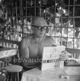 Le Corbusier (Charles-Édouard Jeanneret) at the small restaurant L'Etoile de Mer next to his vacation cabin Le Cabanon. Roquebrune-Cap-Martin 1953. - Photo by Edward Quinn