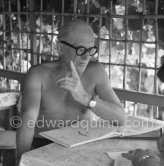 Le Corbusier (Charles-Édouard Jeanneret) interviewed at the small restaurant L'Etoile de Mer next to his vacation cabin Le Cabanon. Roquebrune-Cap-Martin 1953. - Photo by Edward Quinn