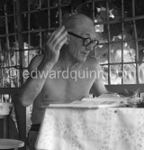 Le Corbusier at the small restaurant L'Etoile de Mer next to his vacation cabin Le Cabanon. Roquebrune-Cap-Martin 1953  Le Corbusier at the small restaurant L'Etoile de Mer attached to his vacation cabin Le Cabanon. Roquebrune-Cap-Martin 1953 - Photo by Edward Quinn