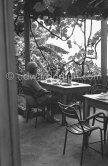 Le Corbusier (Charles-Édouard Jeanneret) overlooking the sea at Cap Martin on the terrace of the restaurant L'Etoile de Mer attached to his vacation cabin Le Cabanon. Roquebrune-Cap-Martin 1953. - Photo by Edward Quinn