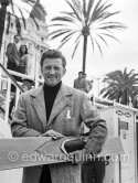 Kirk Douglas with waterski in front of the Carlton Hotel. Cannes Film Festival 1953. - Photo by Edward Quinn
