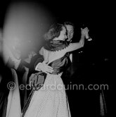Olivia de Havilland and Kirk Douglas at a gala evening. Cannes Film Festival 1953. - Photo by Edward Quinn