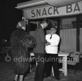 Prince Philip, Duke of Edinburgh with his aunt, the Marquioness of Milford Haven, and Mr. Felix after a dinner at the famous restaurant "Felix". Cannes 1955. - Photo by Edward Quinn