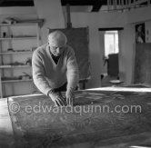 Max Ernst working on the painting "Schwalbennest". Seillans 1966. - Photo by Edward Quinn