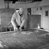 Max Ernst working on the painting "Schwalbennest". Seillans 1966. - Photo by Edward Quinn