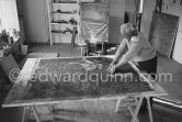 Max Ernst working on the painting "Schwalbennest". Seillans 1966. - Photo by Edward Quinn