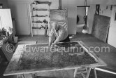 Max Ernst working on the painting "Schwalbennest". Seillans 1966. - Photo by Edward Quinn