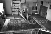 Max Ernst working on the painting "Schwalbennest". Seillans 1966. - Photo by Edward Quinn