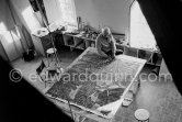Max Ernst working on the painting "Schwalbennest". Seillans 1966. - Photo by Edward Quinn