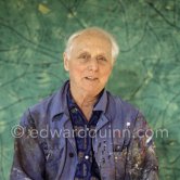 Max Ernst. Behind him the painting "Tremblement de terre printanier". Seillans 1966. - Photo by Edward Quinn