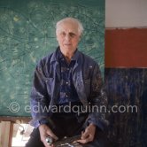 Max Ernst. Behind him the painting "Tremblement de terre printanier". Seillans 1966. - Photo by Edward Quinn