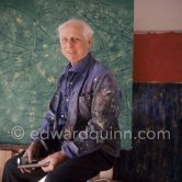 Max Ernst. Behind him the painting "Tremblement de terre printanier". Seillans 1966. - Photo by Edward Quinn