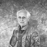 Max Ernst. Behind him the painting "Tremblement de terre printanier". Seillans 1966. - Photo by Edward Quinn